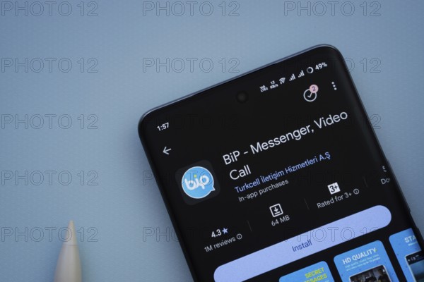 Dhaka, Bangladesh- 29 May 2025: On a blue surface, a smartphone displays the Bip app within the Google Play Store