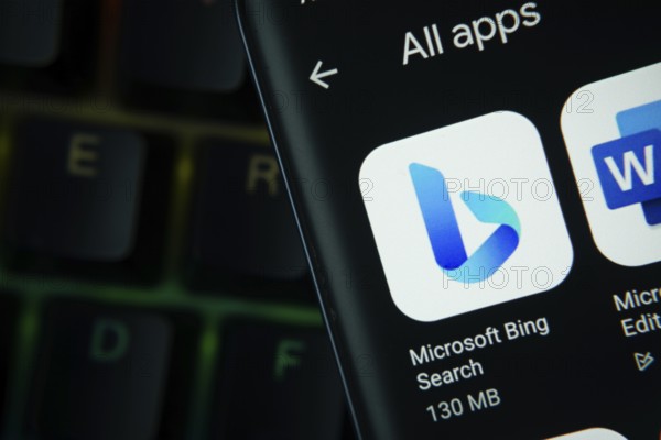Dhaka, Bangladesh- 27 July 2025: Close-up of smartphone screen showing the Microsoft Bing app icon with a dark interface