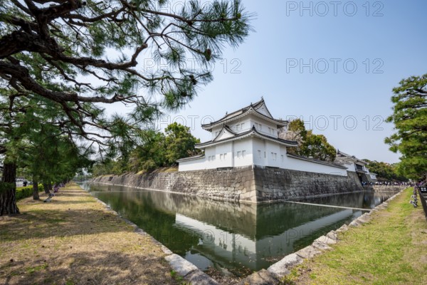 Tonan Sumi-yagura, southeastern watchtower, reflected in the water of the moat, former imperial villa, Nijo Castle, Kyoto, Japan