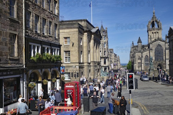 A lively street scene with Gothic buildings and lots of people, Royal Mile, Edinburgh, Scotland, United Kingdom
