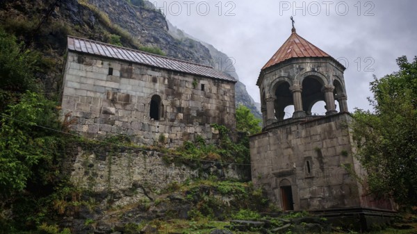 An old monastery with picturesque stone architecture nestled in a mountainous landscape, Debed Canyon, Armenia