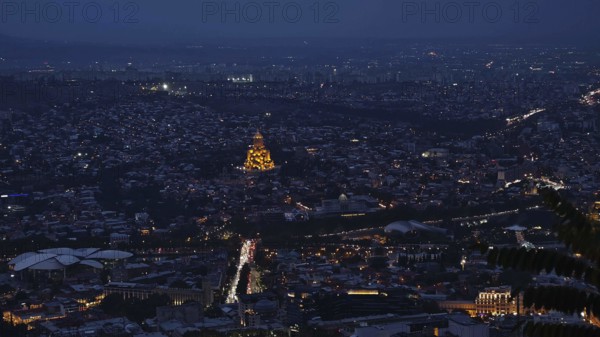 Nocturnal view of Tbilisi with illuminated buildings and roads, Tbilisi, Georgia
