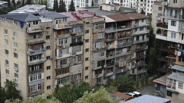 Multi-storey residential building with several balconies in the city, residential silo, prefabricated buildings, Tbilisi, Georgia