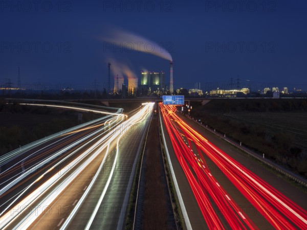 Night shot, long exposure, light trails on the A38 motorway, Schkopau power plant in the back, Saxony-Anhalt, Germany