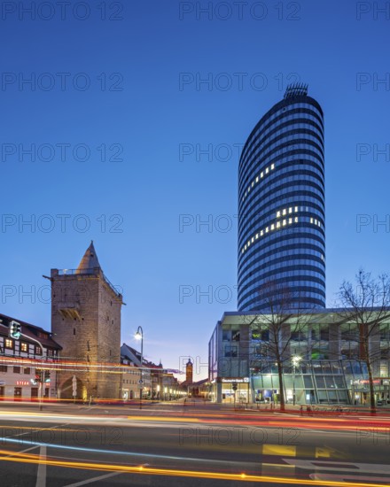 Johannistor and JenTower with light trails from cars at dusk, high-rise building, glass façade, Jena, Thuringia, Germany