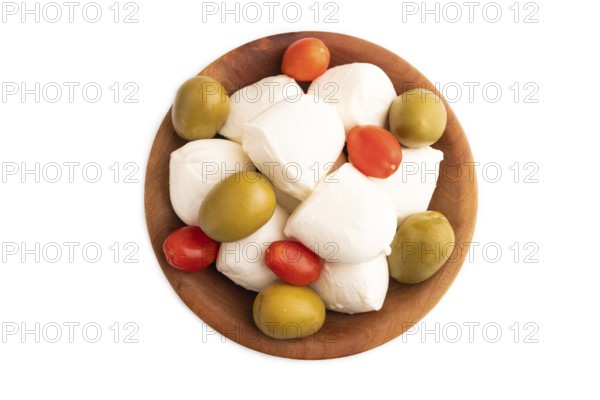 White Mozzarella cheese, with tomatoes and olives in wooden bowl Isolated on white background, top view, flat lay, close up