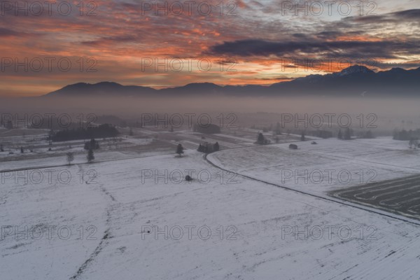 Morning atmosphere, dawn, clouds, sunrise, snow, cold, winter, aerial view, Loisach-Lake Kochel-Moore, view of Benediktenwand, foothills of the Alps, Bavaria, Germany