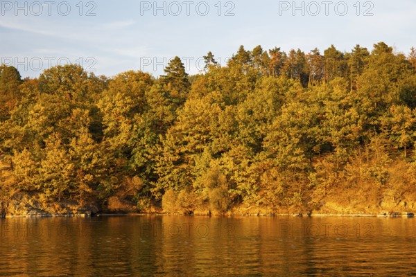 Brno Reservoir (Brnenská prehrada) on the Svratka River on a sunny autumn day. The reservoir is located northwest of the city of Brno in the Czech Republic