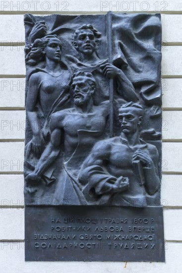 Bronze relief of freedom fighters on a house wall, Lviv, Ukraine