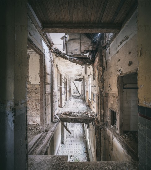Long corridors and collapsed ceilings in a former sanatorium, Lost Place, Saxony-Anhalt, Germany