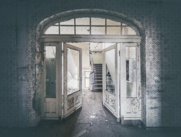 Double door and staircase in a former sanatorium, Lost Place, Saxony-Anhalt, Germany
