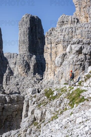 Mountaineers on the Bocchette Centrale band trail, via ferrata in the Brenta Mountains, Brenta-Adamello Natural Park, Trentino, Italy