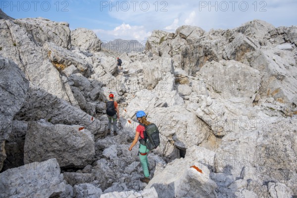 Climbers on a hiking trail, rocky mountain landscape, Via Ferrata SOSAT via ferrata, Brenta Mountains, Trentino, Italy