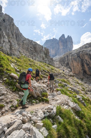 Climbers on a hiking trail, rocky mountain landscape, Via Ferrata SOSAT via ferrata, Brenta Mountains, Trentino, Italy