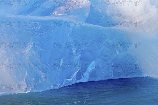 Blue ice wall of Idabreen, Ida glacier calving into Liefdefjorden at Idabukta bay, Haakon VII Land, Spitsbergen, Svalbard, Norway