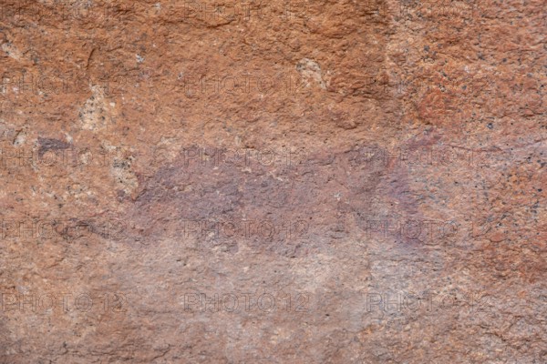Prehistoric rock art on a red rock wall, Spitzkoppe, Namibia