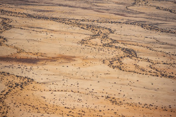 Detailed aerial view of a dry desert with distinctive soil patterns, Spitzkoppe, Namibia