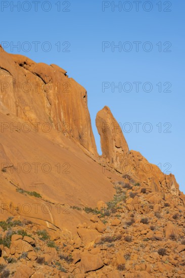 Rock formation, orange rocks in the dry desert landscape Spitzkoppe, Spitzkoppe, Namibia
