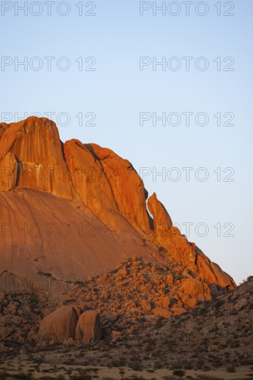 Majestic glowing red rocks in the desert of Spitzkoppe at dusk, Spitzkoppe, Namibia