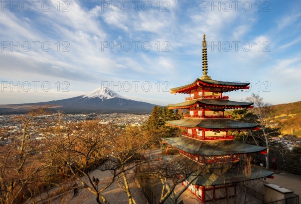 Five-story pagoda of a Shinto shrine in morning light, Chureito Pagoda, with views of Fujiyoshida City and Mount Fuji volcano at sunrise, Arakura Fuji Sengen Shrine, Arakurayama Sengen Park, Yamanashi Prefecture, Japan