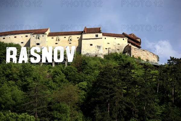 On the hill the medieval fortress Rasnov, Rosenau Castle, Brasov County, Transylvania, Romania