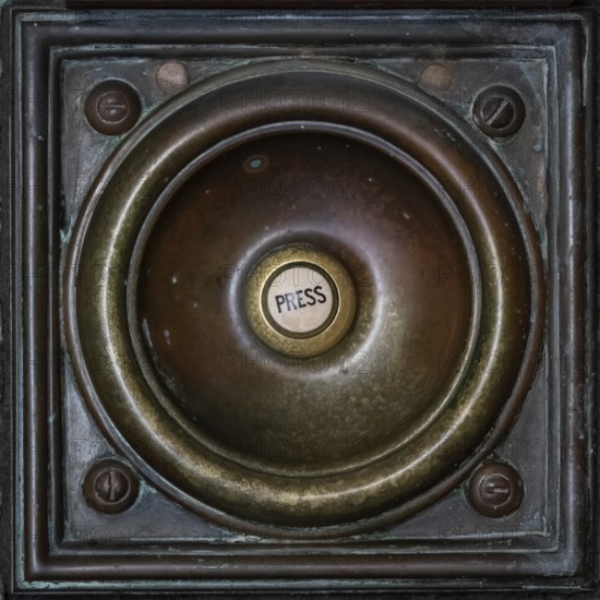 Bronze doorbell with patina and push button with the inscription press, urban and worn look, Royal Academy of Arts, Art Gallery and Academy of Arts, Burlington House, Piccadilly, London, England, Great Britain