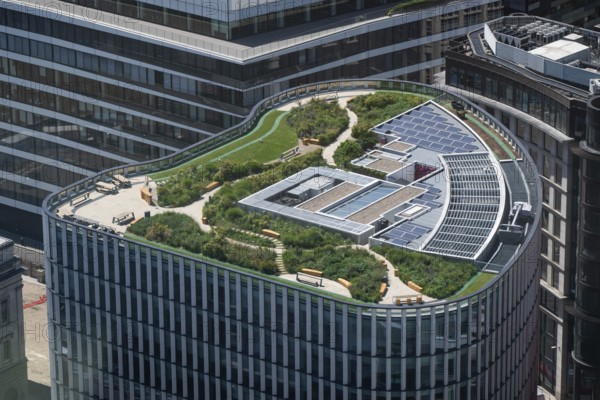 Modern building with green roof and solar panels seen from Sky Gardens, Upper Thames Street and Arthur Street, London, England, Great Britain