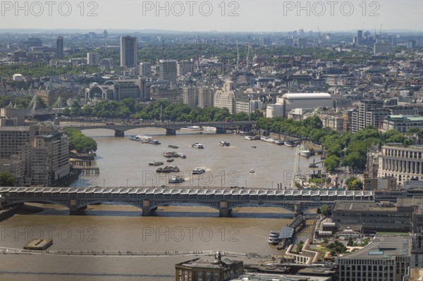 View of the Thames and London city center with bridges and boats, London, England, Great Britain