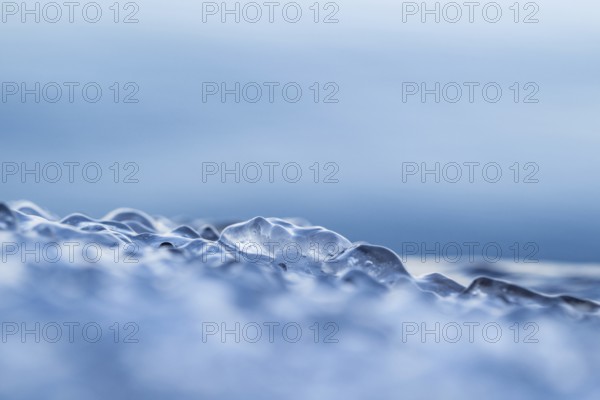 Close-up of ice-covered water in various shades of blue with a mystical aura, Korpoström, Korpo or Korppo, southwestern archipelago, Finland