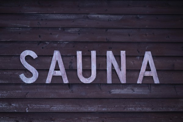 Rustic wooden wall sign with the inscription 'Sauna', Korpoström, Korpo or Korppo, Southwestern Archipelago, Finland