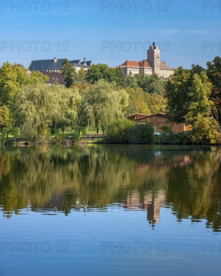 Allstedt Castle and Palace reflected in the lake, site of the Reformation, Saxony-Anhalt, Germany