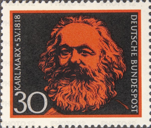 Karl Marx (1818-1883) a German philosopher, economist, historian, sociologist, political theorist, journalist and socialist revolutionary. Portrait on a German post stamp