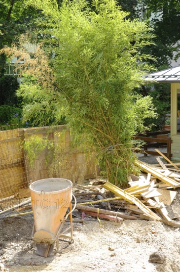 Equipment and wood scraps on a construction site