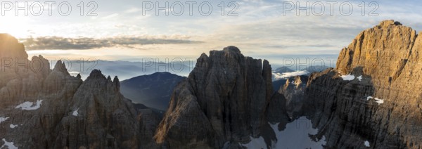 Impressive mountain peaks of the Brenta Mountains, sunrise, 360 degree alpine panorama, aerial view, Brenta, Brenta-Adamello Natural Park, Trentino, Italy