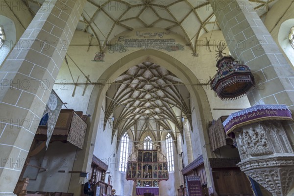 Net vault and late Gothic winged altar in the three-nave hall church, Birthälm fortified church, 15th century, Biertan, Transylvania, Romania
