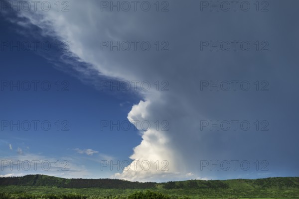 Landscape with approaching rain front (Nimbostratus), southern Carpathian Arc, Romania