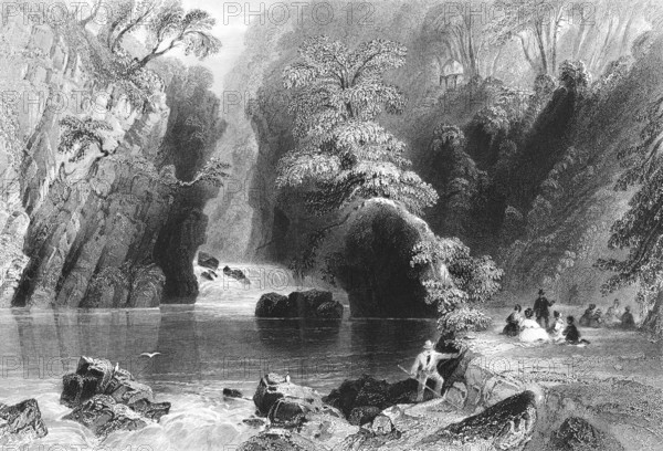 Picnic in greenery on the Dargle River, County Wicklow, Ireland, peaceful atmosphere, idyllic natural landscape, waterfall, gorge, narrow, steep rocks, group, society, leisure, pleasure, attraction, steel engraving, 19th century, historical illustration from 1845