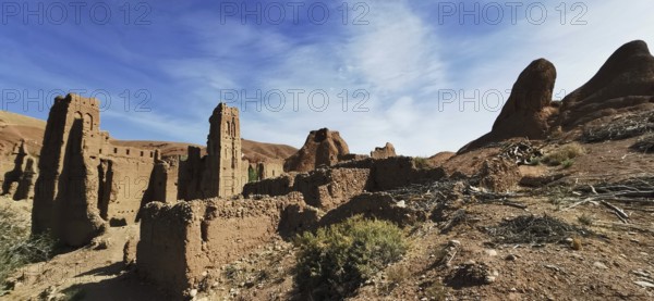 Ancient ruins of a past civilization under bright blue skies in desert-like surroundings, Morocco
