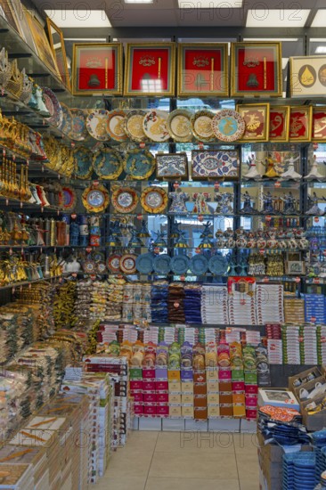 A lively gift shop full of colorful plates and traditional Turkish decorations, Konya, Central Anatolia, Turkey