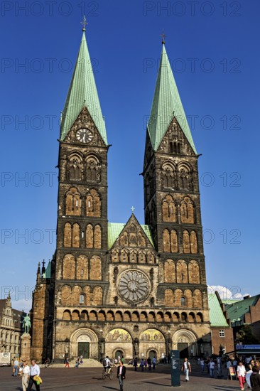Gothic cathedral with two towers and clock under a clear sky, The Cathedral of Bremen