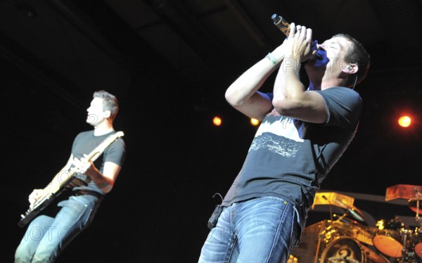 3 Doors Down, US bassist Todd Harrell, singer Brad Arnold (fltr.) performing live in C-Halle on June 11, 2013 in Berlin