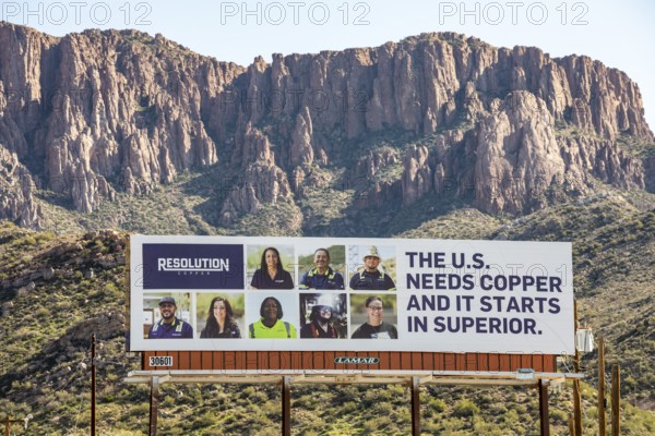Superior, Arizona - A billboard posted by Resolution Copper to promote its proposed underground copper mine at Oak Flat. Members of the San Carlos Apache tribe oppose the mine, saying it would destroy land that has been sacred to them for thousands of years