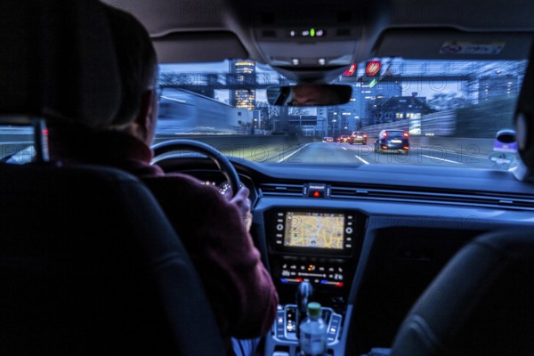 Driving on the A40 motorway, Ruhrschnellweg, in heavy traffic, drivers' perspective, Essen, North Rhine-Westphalia, Germany