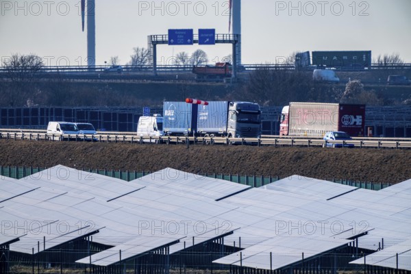 20 MWp open-air photovoltaic system, from RWE, with over 36600 solar modules, in a 200 meter edge, over 1 km long, along the A44 motorway near Bedburg, at the Jackerath triangle, recultivated open-cast mining site, North Rhine-Westphalia, Germany