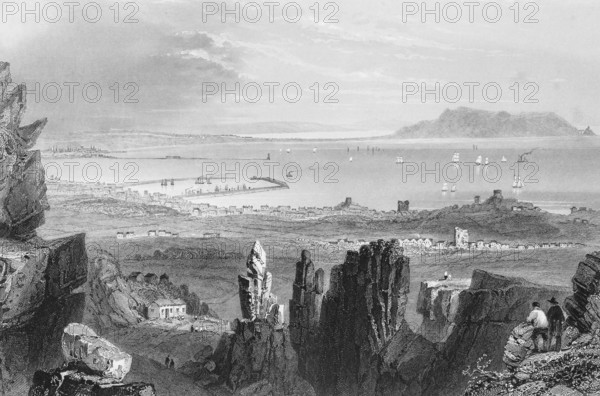 View of the historic port of Dún Laoghaire Harbour, Dublin, Ireland, view from above, Irish Sea, harbour complex, pier, windbreak, many ships, community, pointed rocks, people, observer, plain, coast, landmark, steel engraving, 19th century, historical illustration from 1845