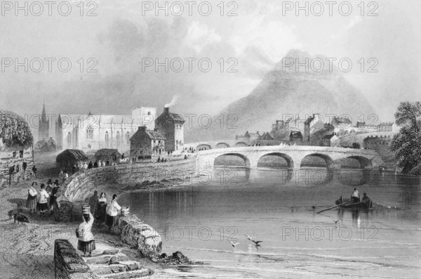 Ballina in the Moy Valley, County Mayo, Ireland, small town idyll, two arched bridges, seawall, street, gothic church, steeple, rowers, seagulls, mountain, people, basket, transportation, landmark, steel engraving, 19th century, historical illustration from 1845