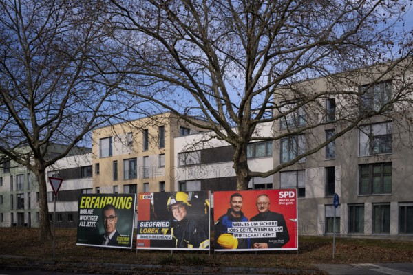 Candidates Cem Özdemir, Andreas Stoch, Siegfried Lorek in fire brigade uniform, the parties CDU, SPD, Alliance 90 Die Grünen, election poster, election posters, 2025 state election, Fellbach, Baden-Württemberg, Germany