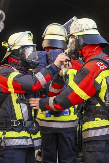Firefighters wearing respirators and protective clothing prepare in the tunnel, fire brigade exercise on the Hermann Hesse Railway, Ostelsheim, Calw district, Germany