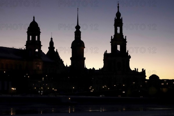 Dresden on a winter evening, castle and court church, Saxony, Germany