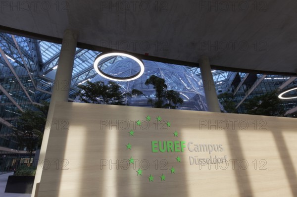 EUREF-Campus Düsseldorf, atrium with logo, European Energy Forum for Climate Protection and Electric Mobility, Energiewende, Düsseldorf, North Rhine-Westphalia, Germany